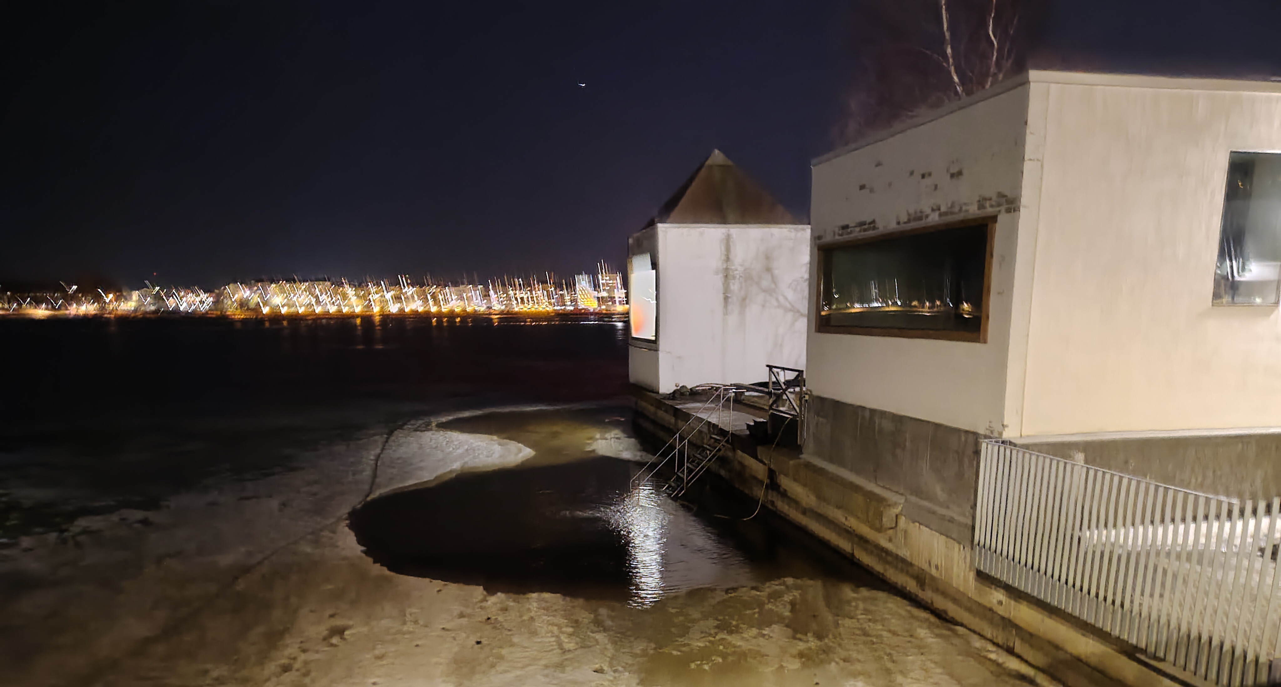 Helsinki's frozen harbour and the ice hole
